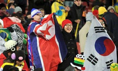 朝鲜男足会在南非世界杯上与美国队分在一个小组吗