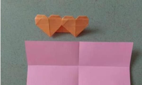 如何折爱心,如何将一张纸叠成一个爱心?图1