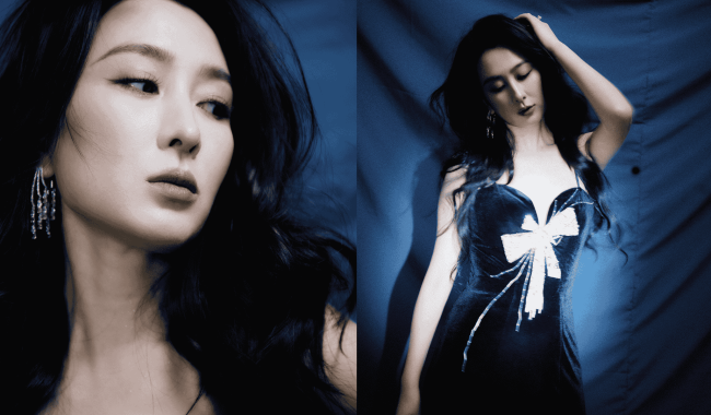 马苏着黑色吊带修身长裙 秀发飞扬身姿摇曳