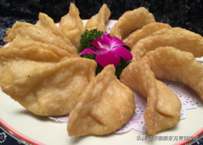 ​名小吃三河米饺，酥脆鲜香，色泽金黄，馅味鲜美